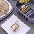 STYARAA Anti-Tarnish Crystal Infinity Ring – Elegant Gold Adjustable Statement Design