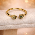 Elegant Twin-Orb Gold Ring with Black Accents