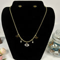Gold Eye Charm Necklace with Crystal Drops
