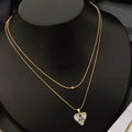 STYARAA Anti-Tarnish Double Layer Heart Pendant Necklace – Elegant Gold Chain with Floral Crystal Charm